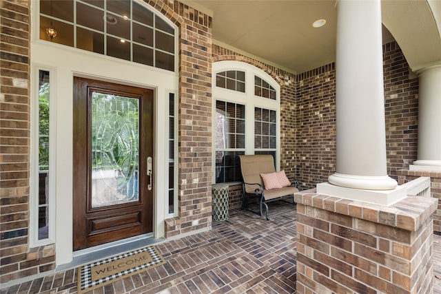 17311 Morgans Lake Dr, Cypress, TX 77433 - doorway to property with brick siding and a porch
