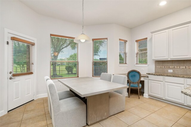 17311 Morgans Lake Dr, Cypress, TX 77433 - dining area featuring light tile patterned flooring