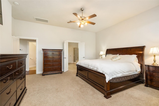 17311 Morgans Lake Dr, Cypress, TX 77433 - bedroom featuring light colored carpet, a ceiling fan, and baseboards