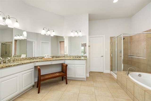 17311 Morgans Lake Dr, Cypress, TX 77433 - full bath featuring a shower stall, double vanity, a garden tub, and tile patterned floors