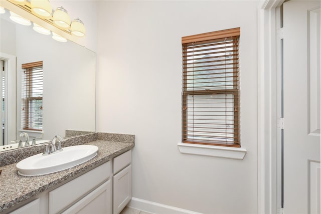 17311 Morgans Lake Dr, Cypress, TX 77433 - bathroom featuring vanity and baseboards