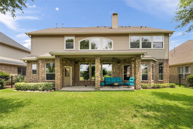 17311 Morgans Lake Dr, Cypress, TX 77433 - back of property featuring outdoor lounge area, a patio, a ceiling fan, a chimney, and brick siding