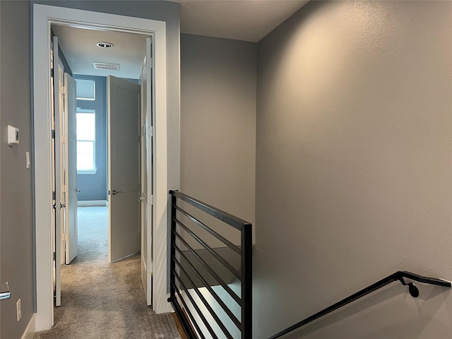 2620 Rusk St, Houston, TX 77003 - stairway featuring carpet