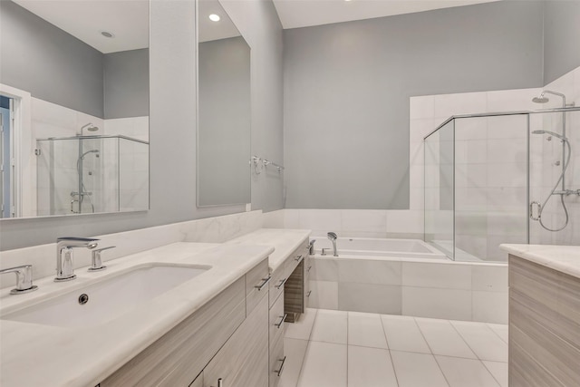 2620 Rusk St, Houston, TX 77003 - full bath with vanity, a bath, a stall shower, recessed lighting, and tile patterned flooring