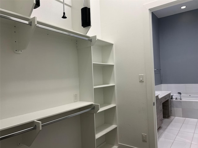 2620 Rusk St, Houston, TX 77003 - spacious closet featuring light tile patterned floors