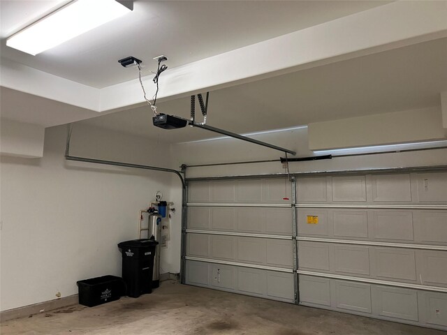 2620 Rusk St, Houston, TX 77003 - garage featuring a garage door opener