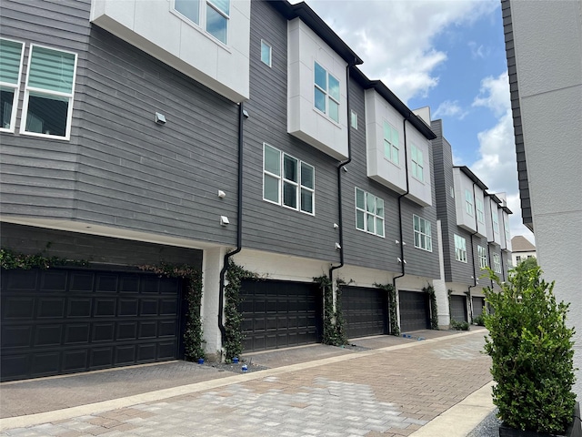 2620 Rusk St, Houston, TX 77003 - view of home's exterior with an attached garage and a residential view