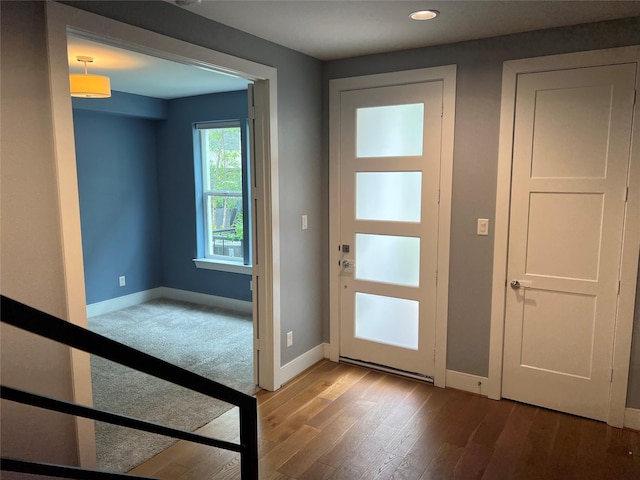 2620 Rusk St, Houston, TX 77003 - entryway with wood finished floors, baseboards, and recessed lighting