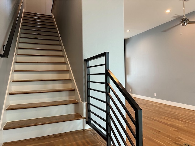 2620 Rusk St, Houston, TX 77003 - stairway with wood finished floors, baseboards, recessed lighting, and ceiling fan