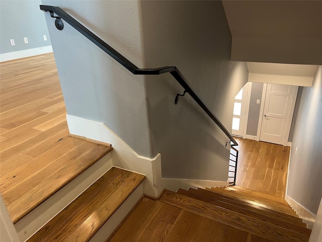2620 Rusk St, Houston, TX 77003 - stairs with wood finished floors and baseboards