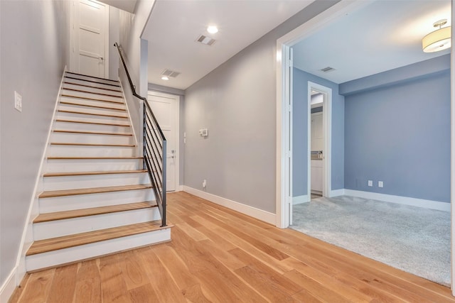 2620 Rusk St, Houston, TX 77003 - stairs with wood finished floors and baseboards