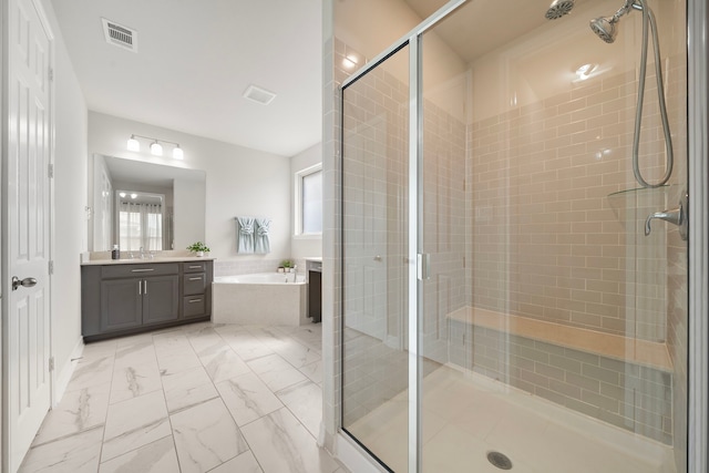 27130 Spanish Wind Ct, Magnolia, TX 77354 - bathroom featuring vanity, a bath, a shower stall, and marble finish floors