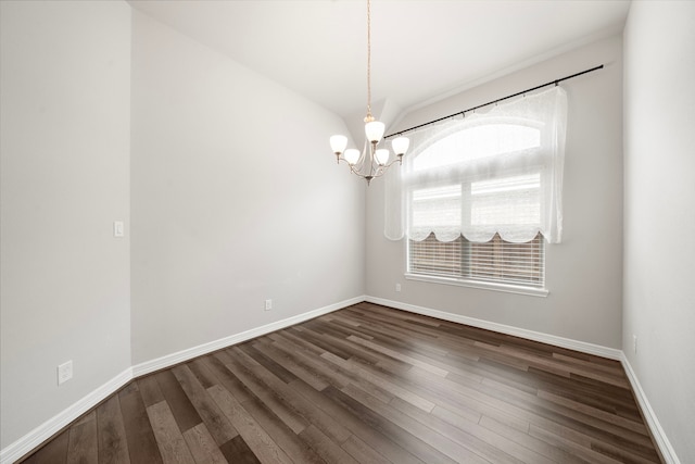 27130 Spanish Wind Ct, Magnolia, TX 77354 - empty room featuring a chandelier, dark wood-type flooring, baseboards, and lofted ceiling