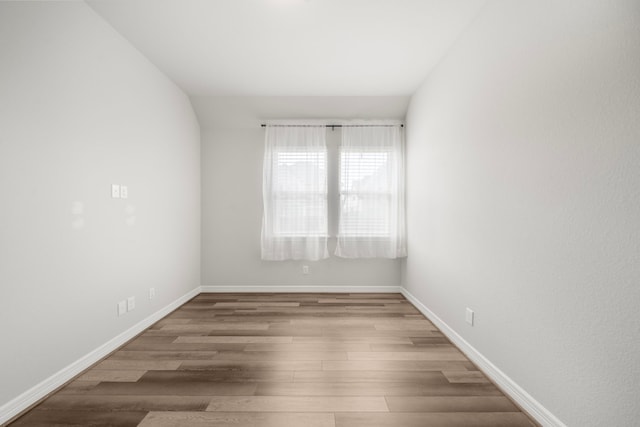 27130 Spanish Wind Ct, Magnolia, TX 77354 - spare room with wood finished floors and baseboards