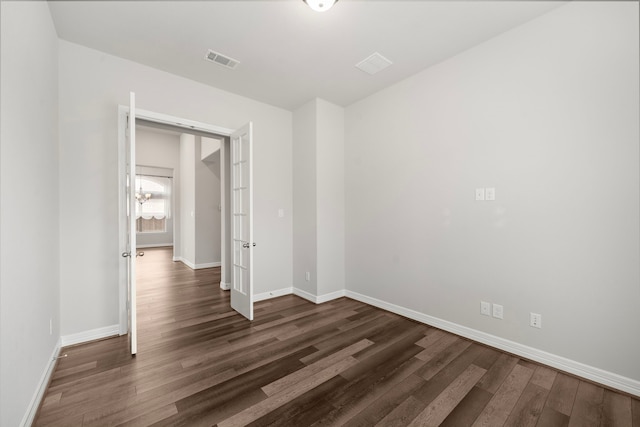 27130 Spanish Wind Ct, Magnolia, TX 77354 - unfurnished room with wood finished floors, baseboards, and french doors