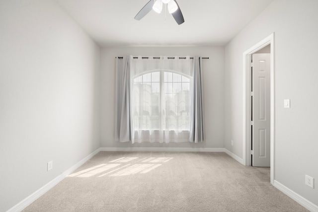 27130 Spanish Wind Ct, Magnolia, TX 77354 - empty room featuring carpet floors, a ceiling fan, and baseboards
