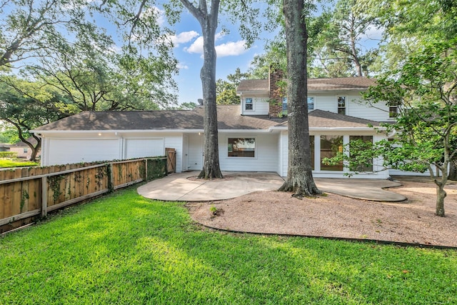 13631 Balmore Cir, Houston, TX 77069 - back of house with a shingled roof and a chimney