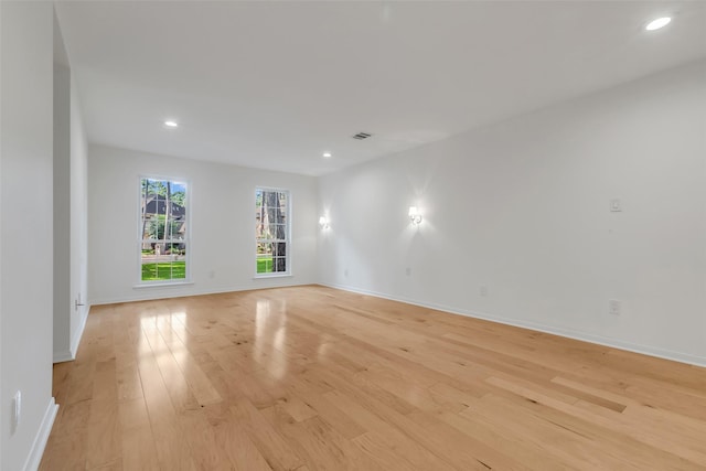 13631 Balmore Cir, Houston, TX 77069 - empty room featuring light wood finished floors, recessed lighting, and baseboards