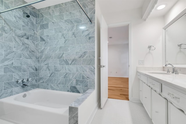 13631 Balmore Cir, Houston, TX 77069 - bathroom featuring vanity, washtub / shower combination, and baseboards