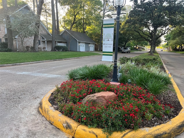 13631 Balmore Cir, Houston, TX 77069 - view of asphalt street with curbs and street lights