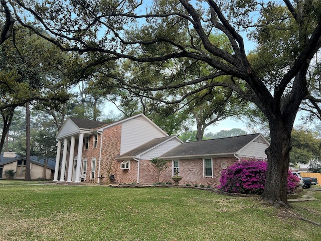 13631 Balmore Cir, Houston, TX 77069 - view of side of property featuring brick siding and a yard