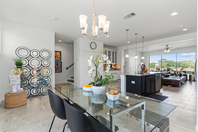 1304 Veranda Mist, League City, TX 77573 - dining space featuring stairs, a ceiling fan, recessed lighting, baseboards, and a chandelier
