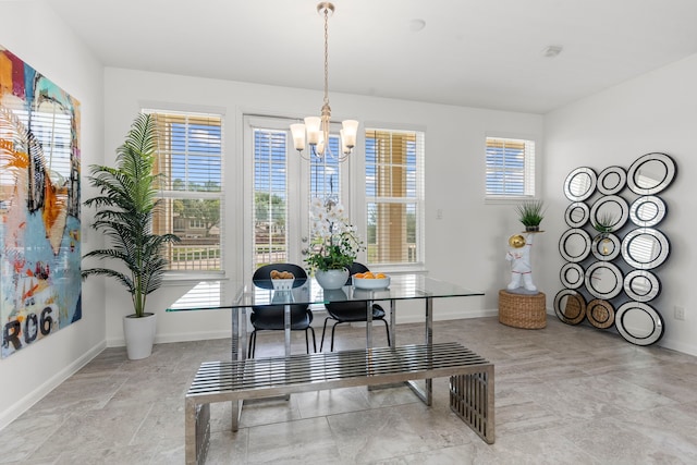 1304 Veranda Mist, League City, TX 77573 - dining space featuring a chandelier and baseboards