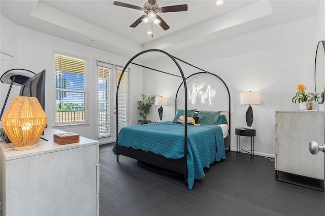 1304 Veranda Mist, League City, TX 77573 - bedroom featuring a raised ceiling, access to outside, and dark wood finished floors