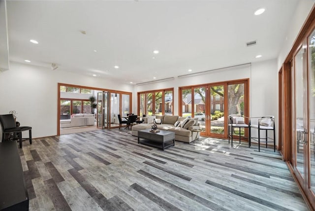 8003 Harbor Point Dr, Houston, TX 77071 - living area featuring french doors, recessed lighting, wood finished floors, and plenty of natural light