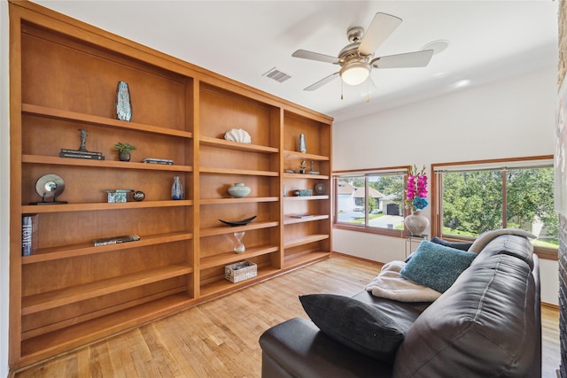 8003 Harbor Point Dr, Houston, TX 77071 - living area with light wood-style flooring and ceiling fan