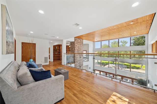 8003 Harbor Point Dr, Houston, TX 77071 - living room featuring wood finished floors and recessed lighting