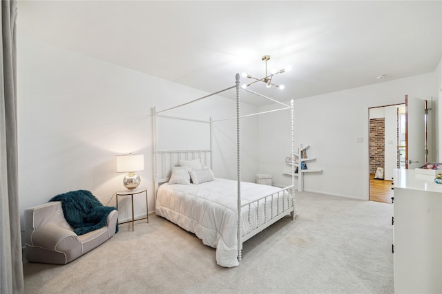 8003 Harbor Point Dr, Houston, TX 77071 - bedroom with carpet flooring, a chandelier, and baseboards