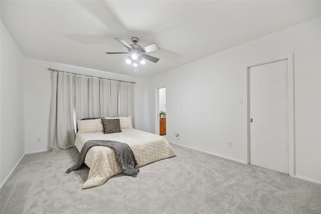 8003 Harbor Point Dr, Houston, TX 77071 - carpeted bedroom featuring baseboards and ceiling fan