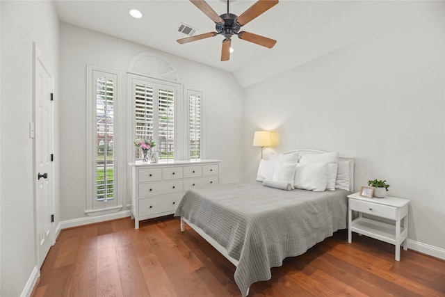 18818 Cypress Chateau Dr, Spring, TX 77388 - bedroom featuring wood finished floors, baseboards, a ceiling fan, vaulted ceiling, and recessed lighting