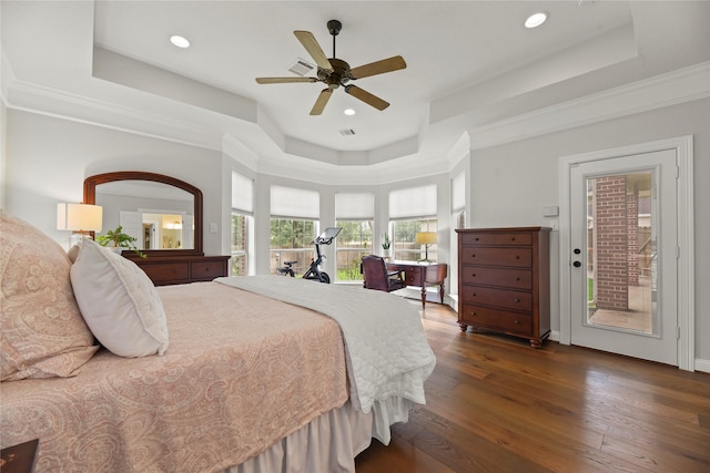 18818 Cypress Chateau Dr, Spring, TX 77388 - bedroom featuring a tray ceiling, dark wood-style flooring, access to exterior, ceiling fan, and recessed lighting