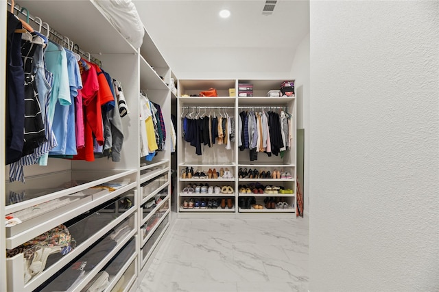 18818 Cypress Chateau Dr, Spring, TX 77388 - spacious closet featuring marble look tile flooring