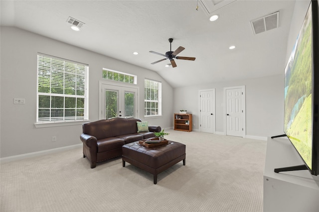 18818 Cypress Chateau Dr, Spring, TX 77388 - living area with vaulted ceiling, french doors, light carpet, a ceiling fan, and baseboards