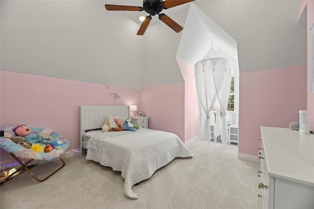 18818 Cypress Chateau Dr, Spring, TX 77388 - bedroom with light colored carpet, vaulted ceiling, baseboards, and ceiling fan