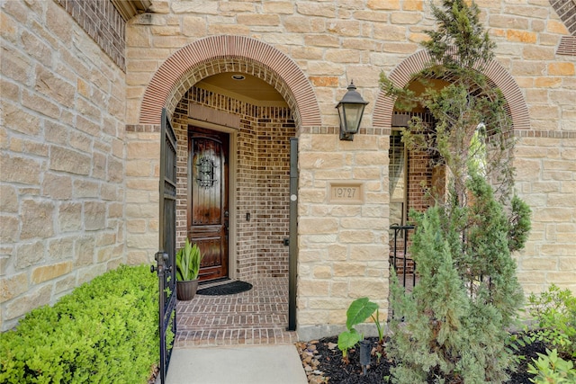 10727 Stone Isle Ct, Richmond, TX 77407 - view of exterior entry with brick siding