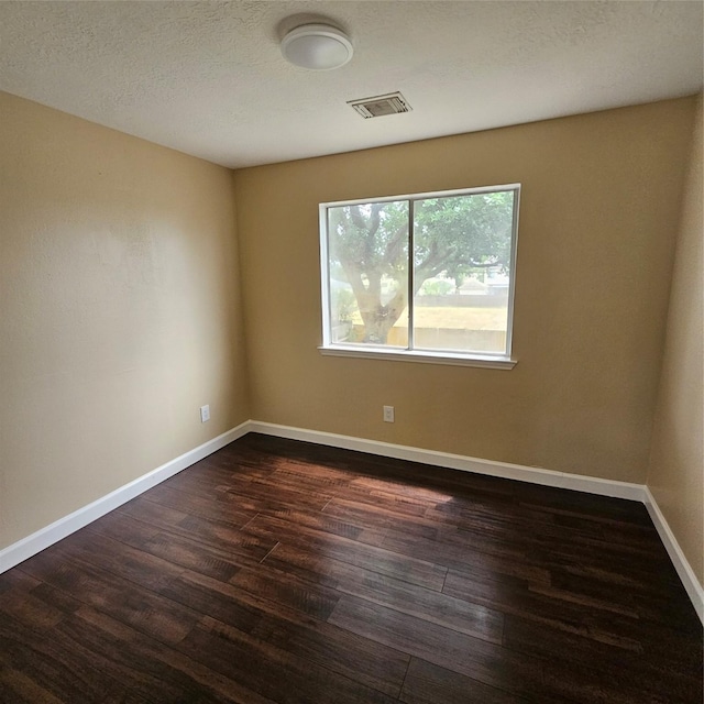 6118 Deep S Dr, Katy, TX 77449 - spare room with dark wood-style flooring and baseboards
