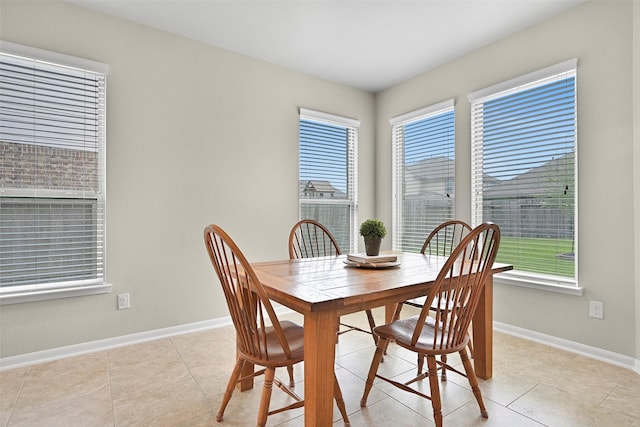 2708 Merlin Ln, Pearland, TX 77581 - dining area with healthy amount of natural light and baseboards