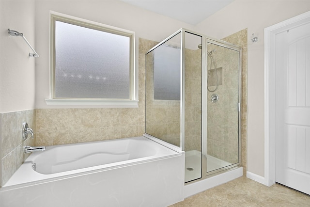 2708 Merlin Ln, Pearland, TX 77581 - full bath featuring a shower stall, a garden tub, and tile patterned flooring