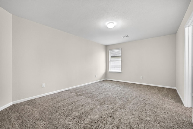 2708 Merlin Ln, Pearland, TX 77581 - unfurnished room with carpet floors, baseboards, and a textured ceiling