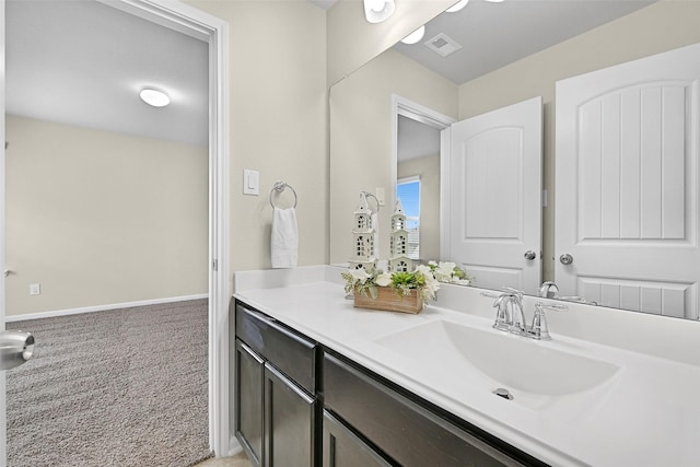 2708 Merlin Ln, Pearland, TX 77581 - bathroom with vanity and baseboards