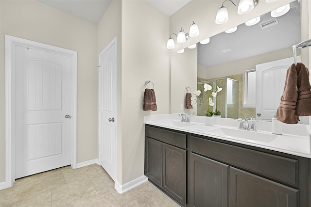 2708 Merlin Ln, Pearland, TX 77581 - full bathroom featuring a shower stall, double vanity, baseboards, and tile patterned flooring