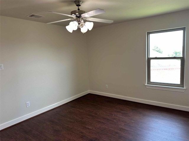 24811 Deep Coral Ct, Katy, TX 77494 - empty room with dark wood finished floors, baseboards, and a ceiling fan