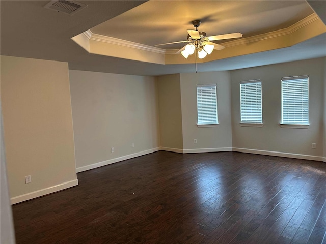 24811 Deep Coral Ct, Katy, TX 77494 - unfurnished room featuring a tray ceiling, crown molding, ceiling fan, dark wood-style floors, and baseboards