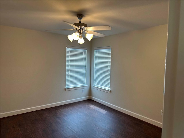 24811 Deep Coral Ct, Katy, TX 77494 - empty room with dark wood-type flooring, baseboards, and ceiling fan