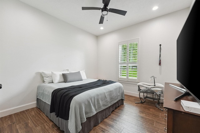9343 Kai Dr, Beach City, TX 77523 - bedroom with wood finished floors, baseboards, recessed lighting, and ceiling fan
