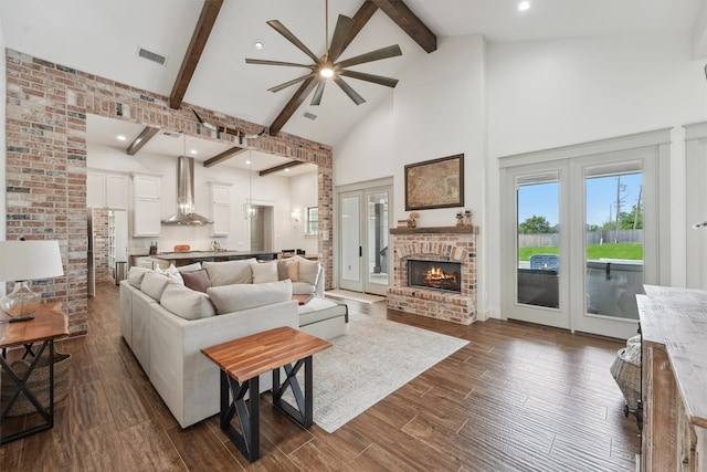 9343 Kai Dr, Beach City, TX 77523 - living area with a ceiling fan, beamed ceiling, high vaulted ceiling, french doors, and dark wood-style flooring